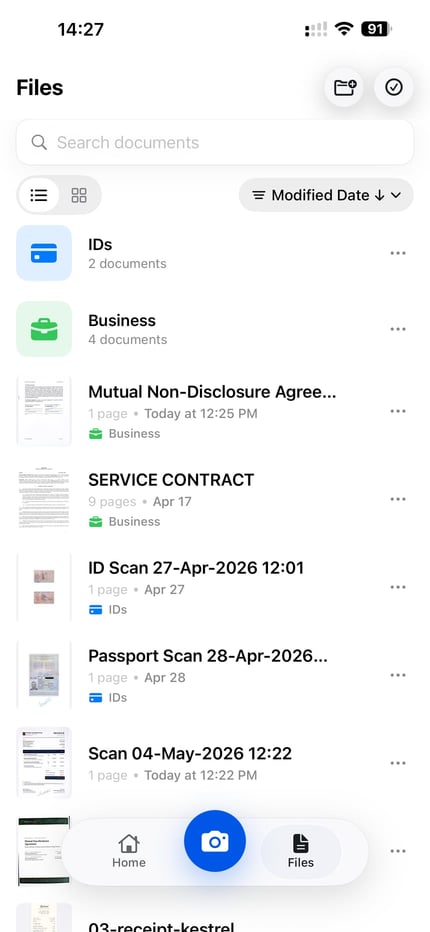 ScanLens library on iPhone showing organized documents and a search that matches text inside the scans